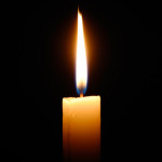 depositphotos_12116880-stock-photo-burning-candle-isolated-on-black